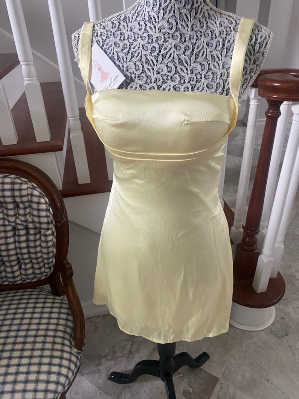 Beautiful pale yellow lined mini dress with lace up back